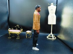 black action figure side